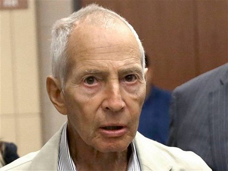 Police carry 2 boxes from home of millionaire Robert Durst